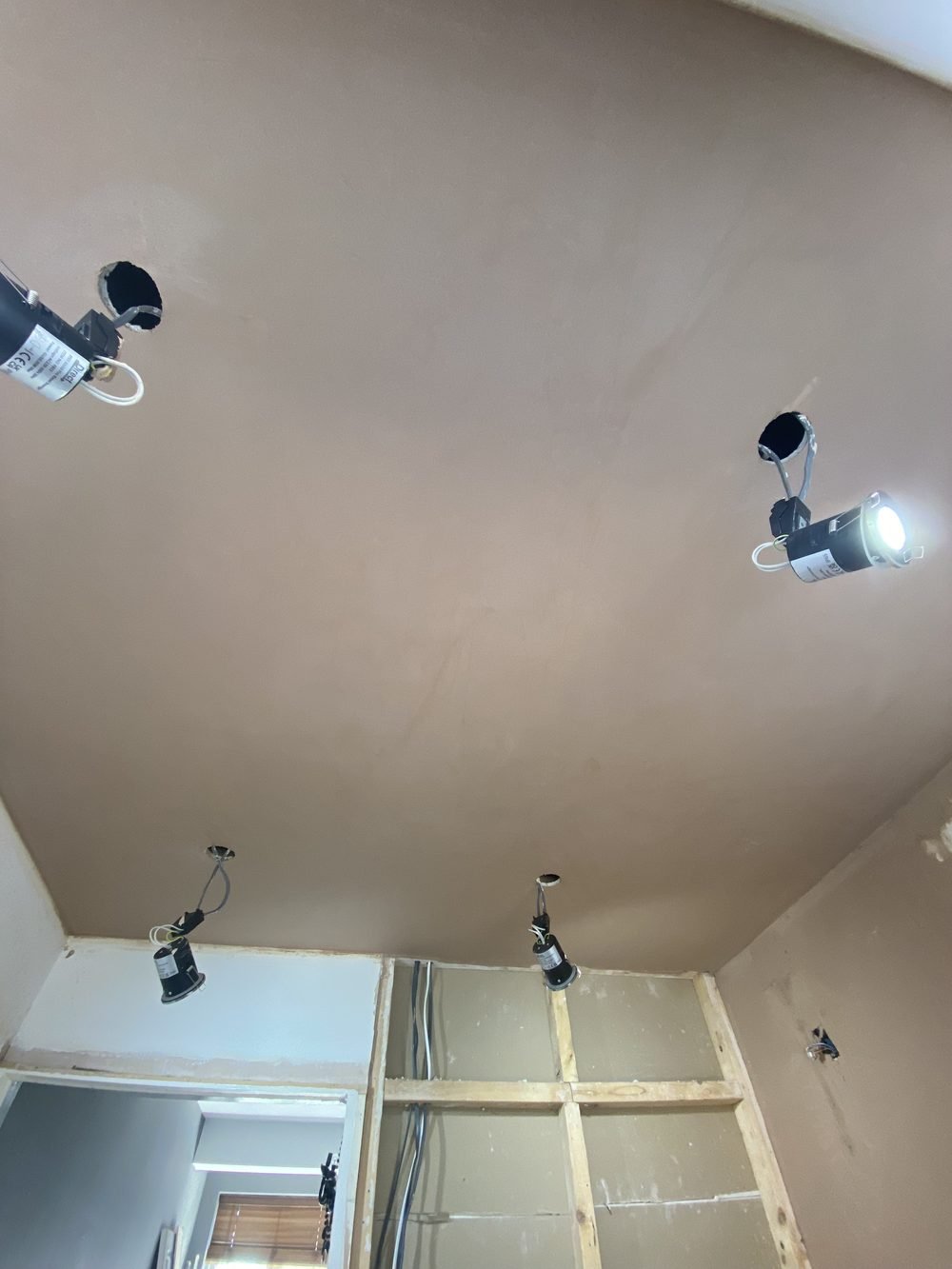 Freshly plastered ceiling with downlights, Solihull